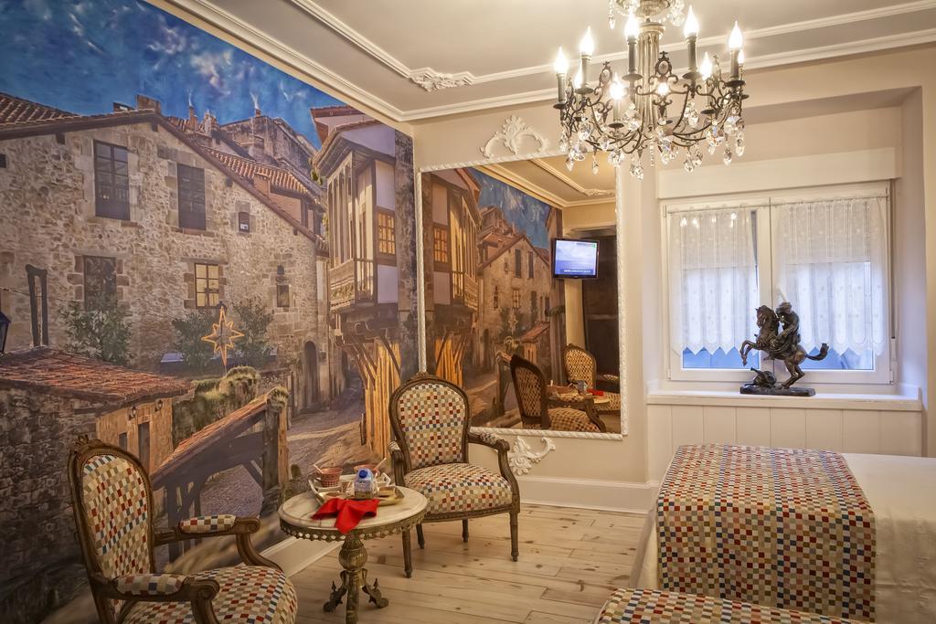 Hostal Boutique Puerta Del Sol Торрелавега Номер фото